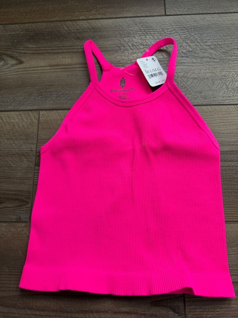 Free People Movement Happiness Runs Crop Tank in a bright pink color